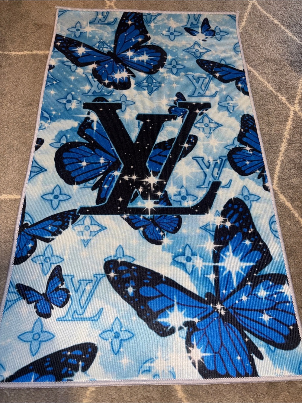 Source Unknown Blue Butterfly Logo Bath Mat